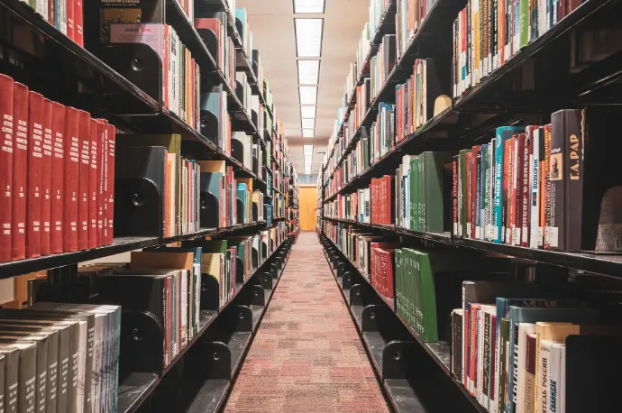 a long row of books in a library